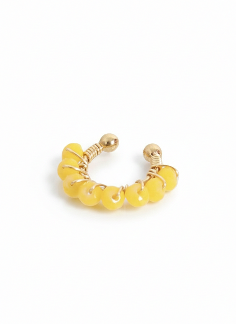 Earcuff Maiorca di GLAMORIZE STUDIO, dettaglio in metallo con design elegante e moderno, visibile sul orecchio.