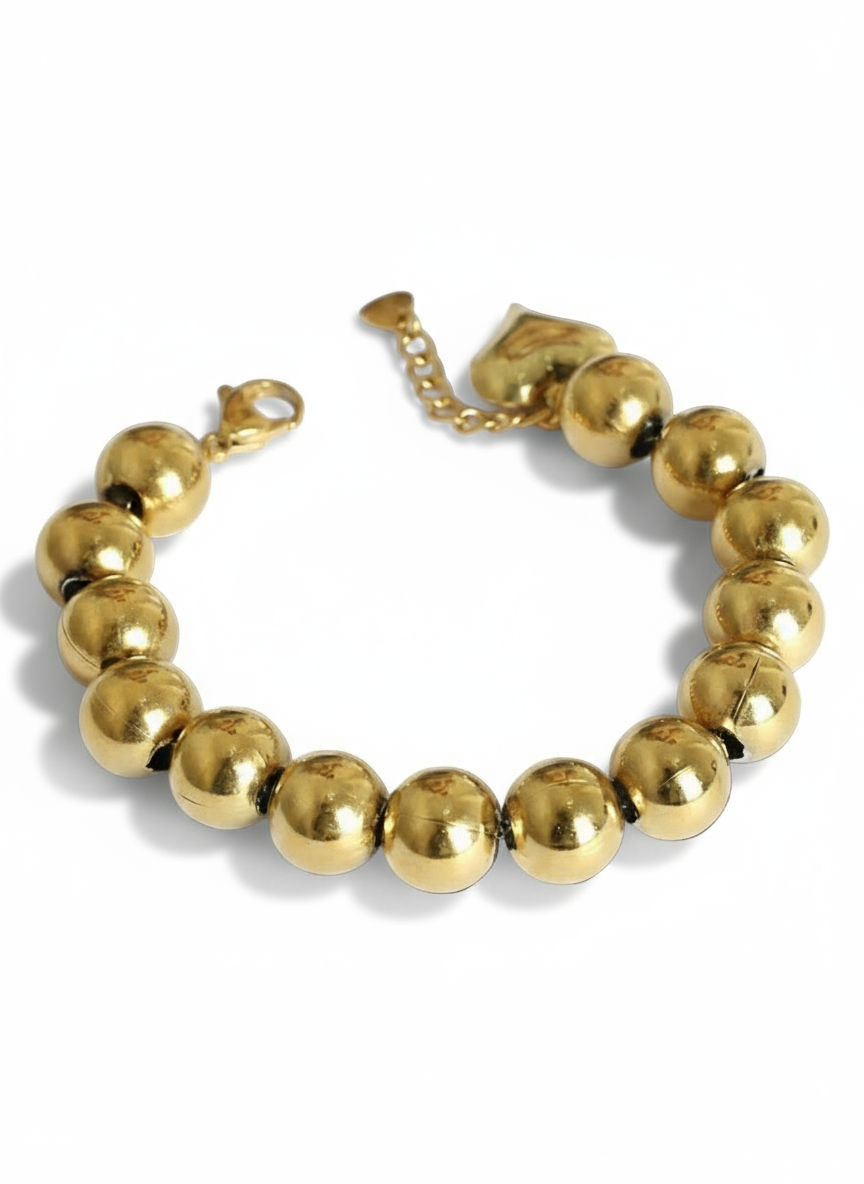Bracciale sonaglio in metallo dorato di Glamourize Studio, con piccoli pendenti che tintinnano, elegante e delicato.