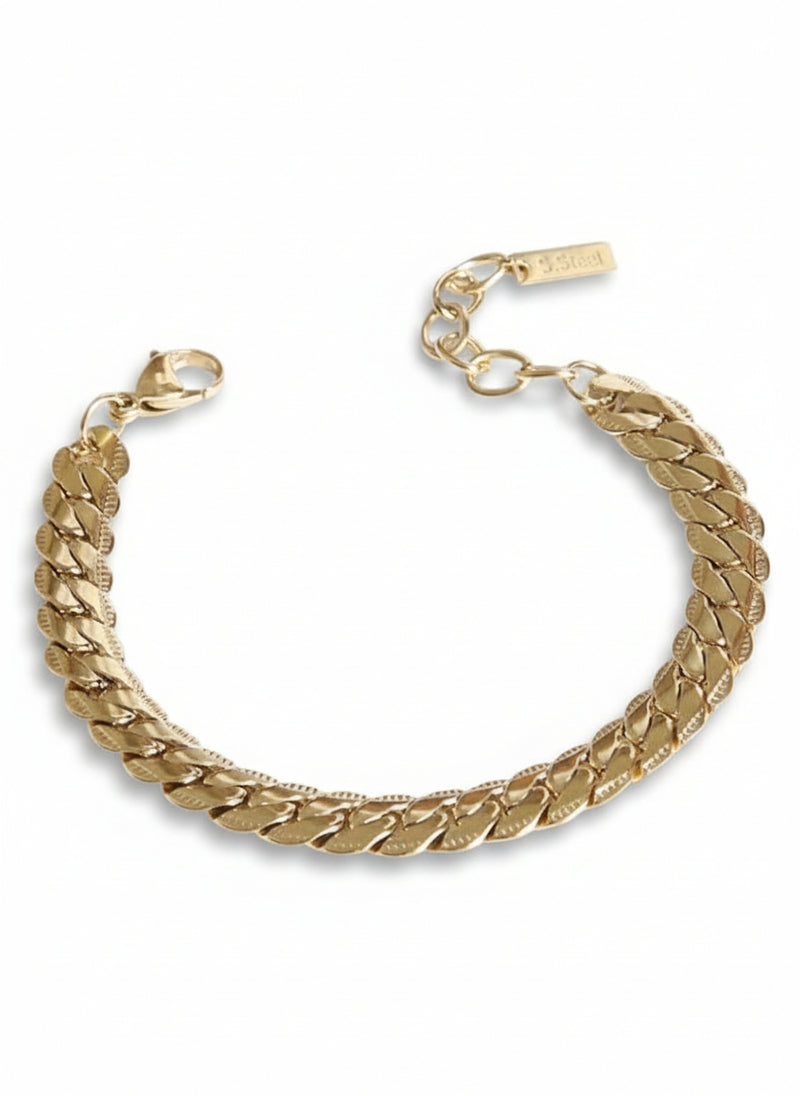 Bracciale Cuban in metallo dorato di Glamourize Studio, mostra dettagli e design elegante su sfondo neutro.